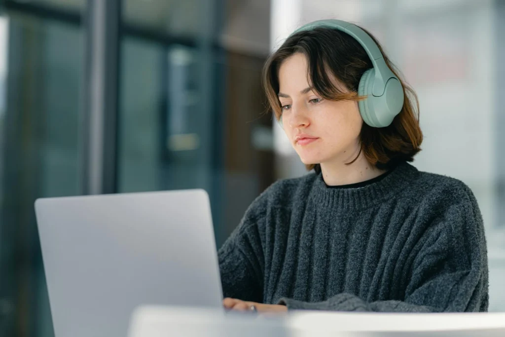 Focused work with headphones showing balance against distraction